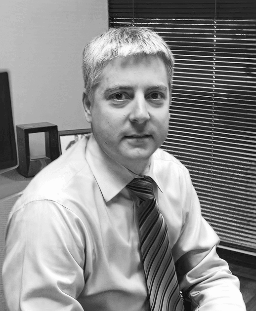 Black and white headshot of Brian Interdonato, JPMorgan Chase & Co., endorsing Chris Flakus’s respected position in the Professional Staffing and Executive Search industries.